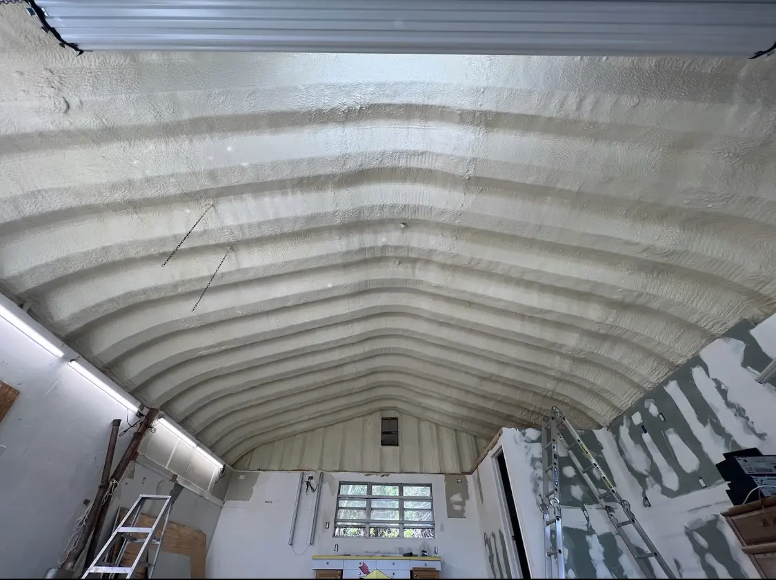 Spray polyurethane foam applied to the underside of a metal roof deck in River Forest